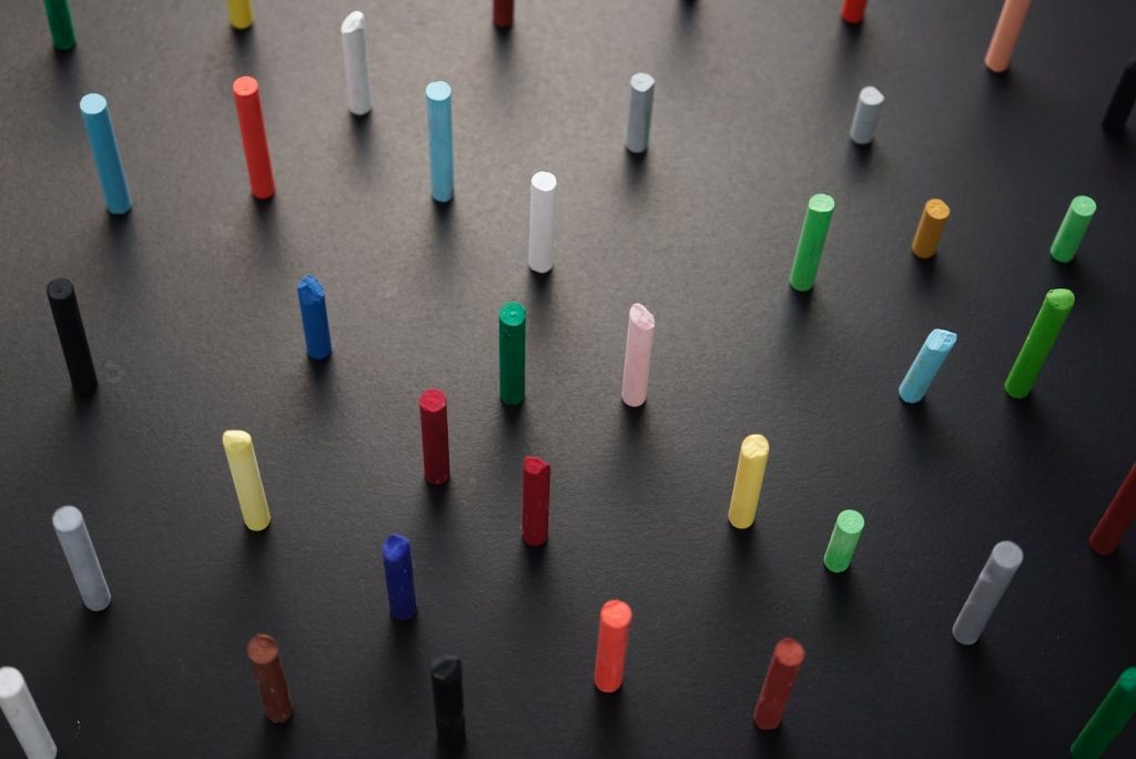 green orange and blue plastic tube